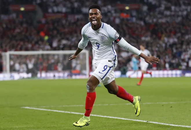 Daniel Sturridge proslavlja po golu v mreži Škotske na tekmi kvalifikacij za SP 2018. FOTO: Carl Recine/Reuters