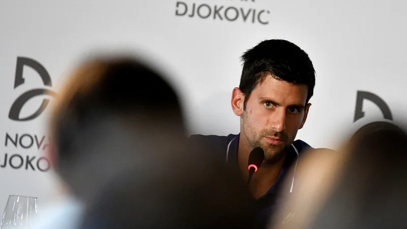 Fotografija: Novak Đoković (na fotografiji) na arhivski fotografiji med novinarsko konferenco v Beogradu. FOTO: Andrej Isaković/Reuters