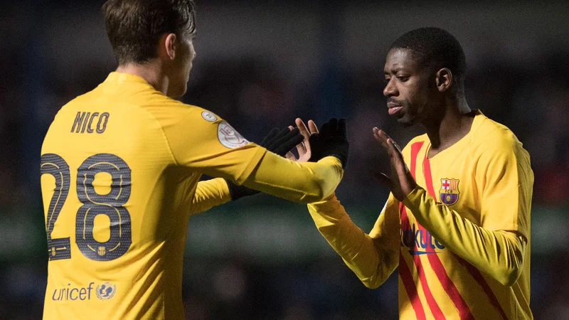 Fotografija: Nico Gonzalez in Ousmane Dembele. FOTO: Jorge Guerrero/AFP