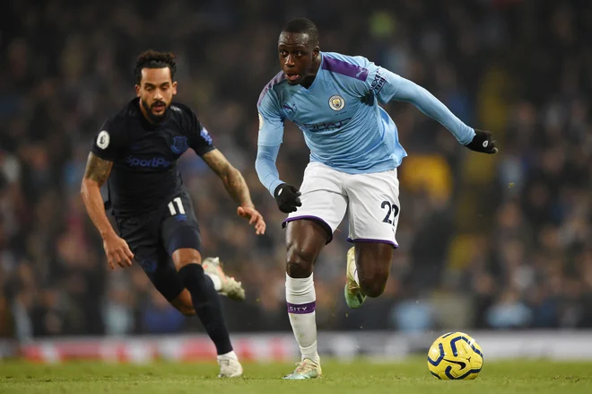 Benjamin Mendy, desno, je zdaj v hišnem priporu. FOTO: Oli Scarff/AFP

