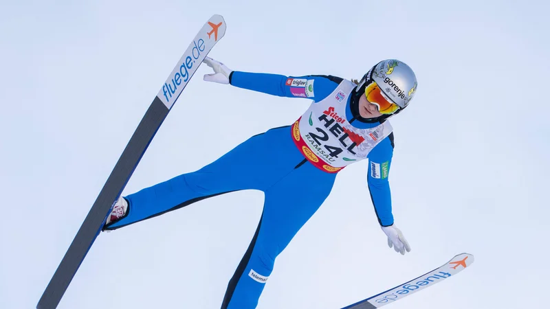 Fotografija: Ema Volavšek je pri skakanju pridobila eno mesto. FOTO: Georg Hochmuth/AFP
