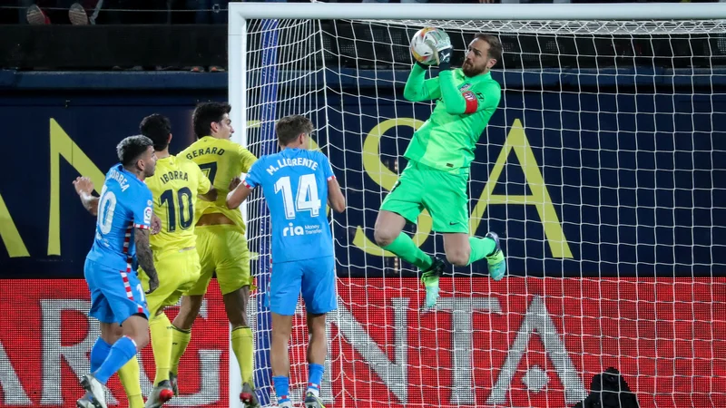 Fotografija: Jan Oblak se je z Atleticom pogosto uvrščal v evropska finala in v njih tudi zmagoval, v finalu katerega od dveh španskih pokalnih tekmovanj pa je nastopil zgolj enkrat. FOTO: Jose Jordan/AFP