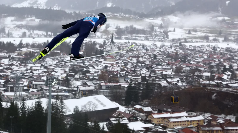 Fotografija: Bo Kamil Stoch poletel v Peking? FOTO: Kai Pfaffenbach/Reuters