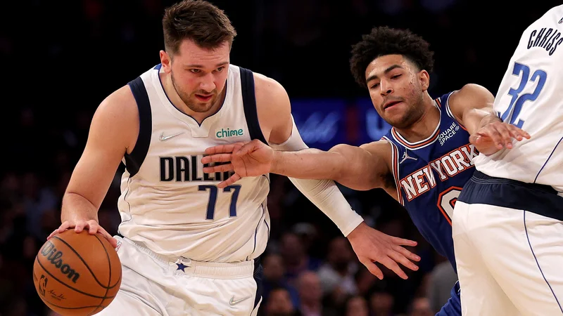 Fotografija: Luka Dončić si je pripisal nov trojni dvojček v ligi NBA. FOTO: Elsa/AFP