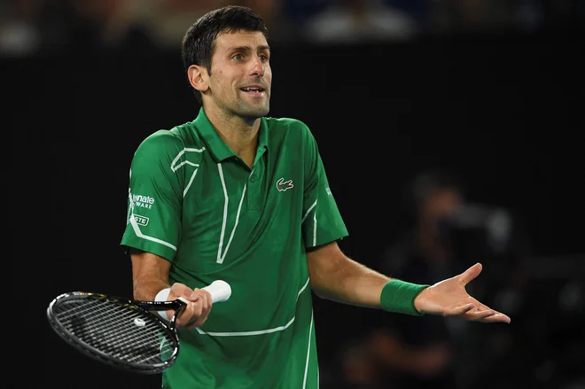 Novak Đoković bo spoštoval odločitev sodišča. FOTO: Greg Wood/AFP
