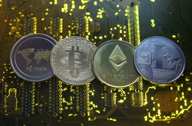 Ripple, bitcoin, etherum in litecoin so le štiri izmed več kot 16.000 kriptovalut. FOTO: Dado Ruvić/Reuters
