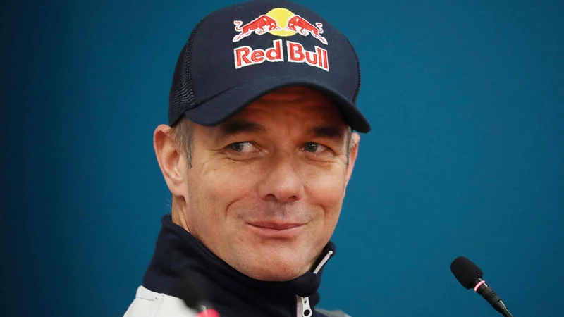 Fotografija: Sebastien Loeb (na fotografiji) med novinarsko konferenco pred začetkom letošnjega uvodnega relija, ki bo zanj že zadnji v sezoni. FOTO: Valery Hache/AFP
