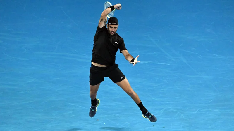 Fotografija: Matteo Berrettini med maratonom z Gaelom Monfilsom. FOTO: Morgan Sette/Reuters