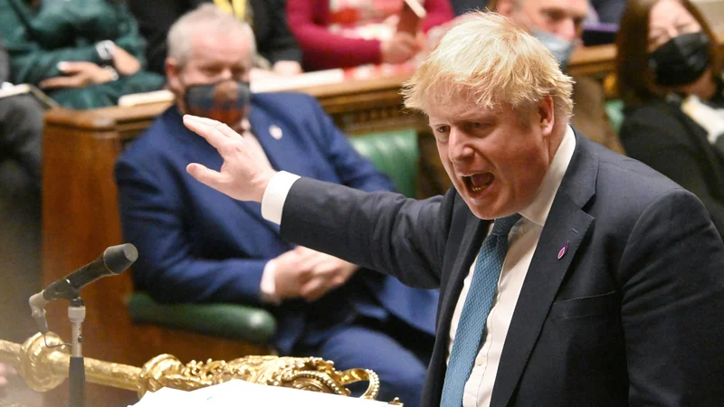 Fotografija: Britanski premier Boris Johnson med današnjim nastopom v spodnjem domu britanskega parlamenta Foto: Jessica Taylor/Afp