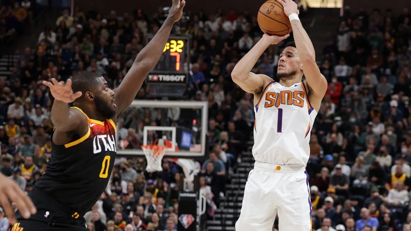 Fotografija: Phoenixov adut Devin Booker v akciji. FOTO: Chris Nicoll/Usa Today Sports
