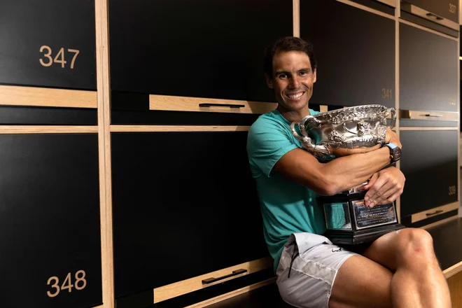 Rafael Nadal se je veselil nepričakovane lovorike. FOTO: Fiona Hamilton/AFP