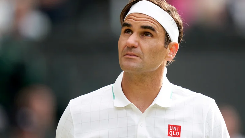 Fotografija: Roger Federer med julijskim nastopom v Wimbledonu, kjer ga je prepričljivo v četrtfinalu ugnal Poljak Hubert Hurkacz. FOTO: Peter van den Berg/USA TODAY Sports
