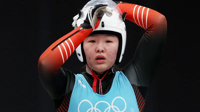 Fotografija: Kitajka Wang Peixuan med treningom v bobu enosedu. FOTO: Edgar Su/Reuters
