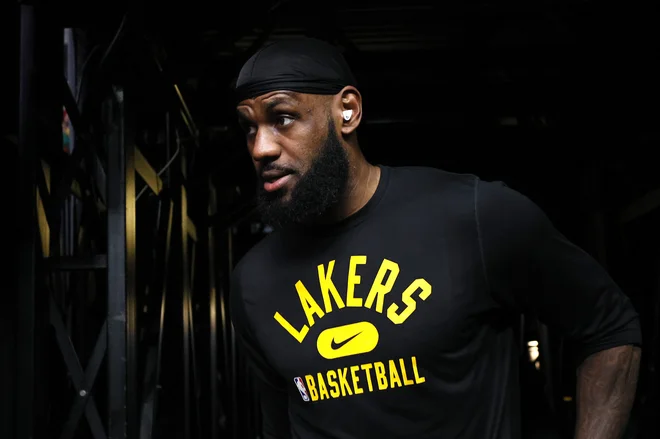 Kapetan zahodne ekipe LeBron James ni pozabil na Luko Dončića. FOTO: Steph Chambers/AFP
