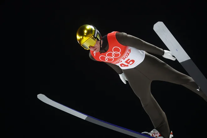 Timi Zajc je imel med kvalifikacijskim skokom v zraku precej težav. FOTO: Hannah Mckay/Reuters
