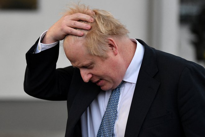 Britanski premier Boris Johnson se je v začetku januarja sredi največjega škandala svojega mandata. Foto: Daniel Leal/Reuters

