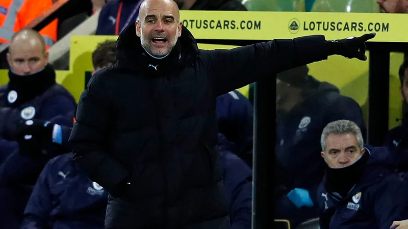 Fotografija: Pep Guardiola po odhodu iz Barcelone neuspešno lovi zmago v ligi prvakov. Lani je ostal tik pred ciljno črto, v finalu je bil boljši angleški tekmec Chelsea. FOTO: Adrian Dennis/AFP