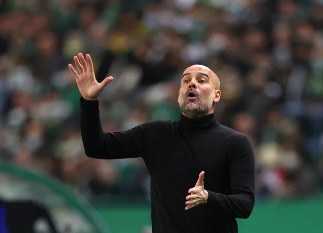 Pep Guardiola ne bo ponovil napak iz prejšnjih sezon. FOTO: Carl Recine/Reuters
