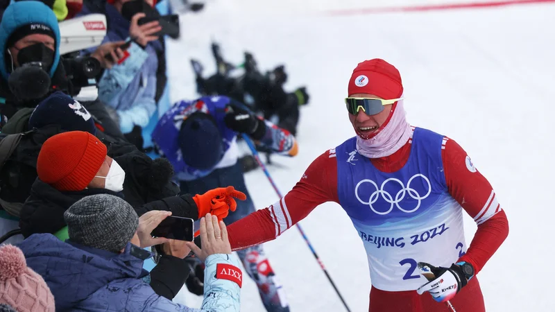 Fotografija: Aleksander Bolšunov je reprezentanci z obeležji Ruskega olimpijskega komiteja prinesel novo zlato kolajno. FOTO: Lindsey Wasson/Reuters
