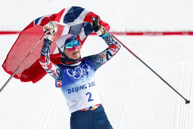 Norvežanka Therese Johaug je pekinške nastope zaokrožila s tretjo zlato kolajno na posamičnih preizkušnjah. FOTO: Odd Andersen/AFP
