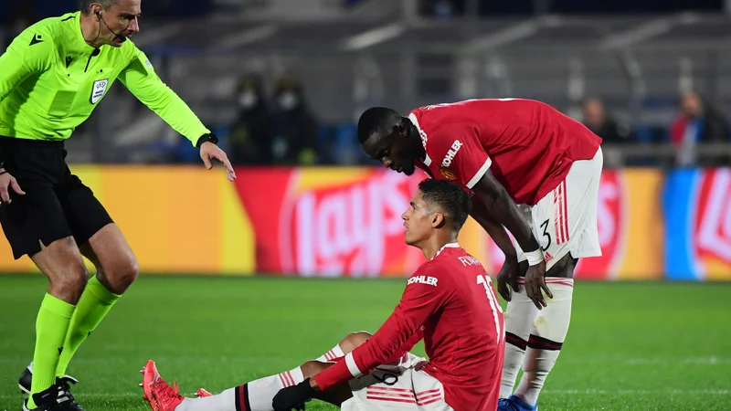 Fotografija: Slavko Vinčić, Cristiano Ronaldo in Eric Bailly med novemrbsko tekmo v ligi prvakov. FOTO: Alberto Lingria/Reuters
