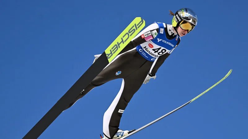Fotografija: Urša Bogataj je bila s slovensko ekipo tekmovalno v ognju in končala na tretjem mestu. FOTO: Barbara Gindl/AFP