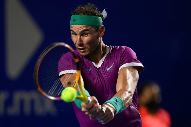 Rafael Nadal med dvobojem s Cameronom Norriejem. FOTO: Pedro Pardo/AFP
