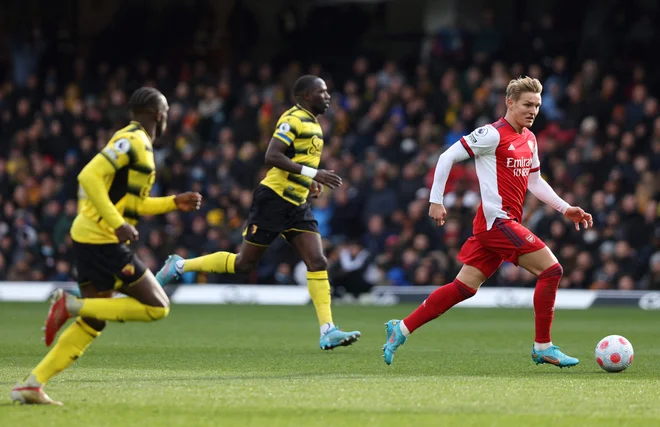 Martin Ødegaard (desno) je dirigiral Arsenalovi igri. FOTO: Adrian Dennis/AFP
