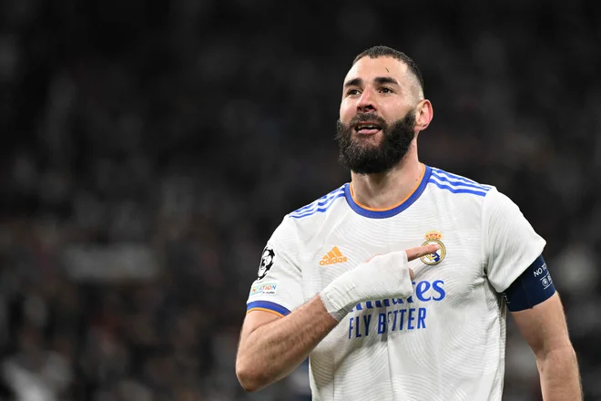 Karim Benzema je bil veliki junak tekme v Madridu. Foto Gabriel Bouys/AFP
