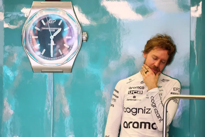 Sebastian Vettel si bi lahko veliko nagrado Bahrajna ogledal zgolj po televiziji. FOTO: Giuseppe Cacace/AFP
