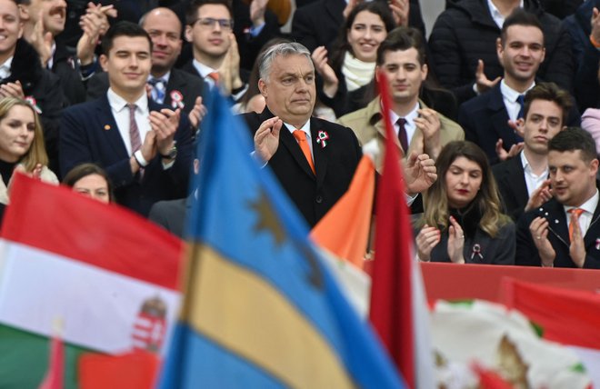 Orbán je večkrat pohvalil Rusijo za njeno uspešno »neliberalno« družbo in se rutinsko pridružil Putinu pri obsojanju Evropske unije in zveze Nato.FOTO: Attila Kisbenedek/Afp
