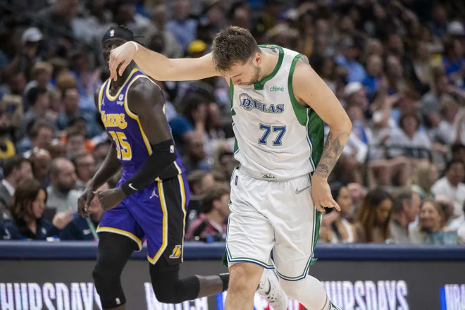 Luka Dončić se je veselil trojke proti Lakers. FOTO: Jerome Miron/ USA Today Sports
