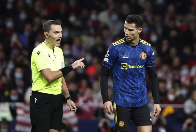 Ovidiu Hategan in Cristiano Ronaldo. FOTO: Javier Barbancho/Reuters
