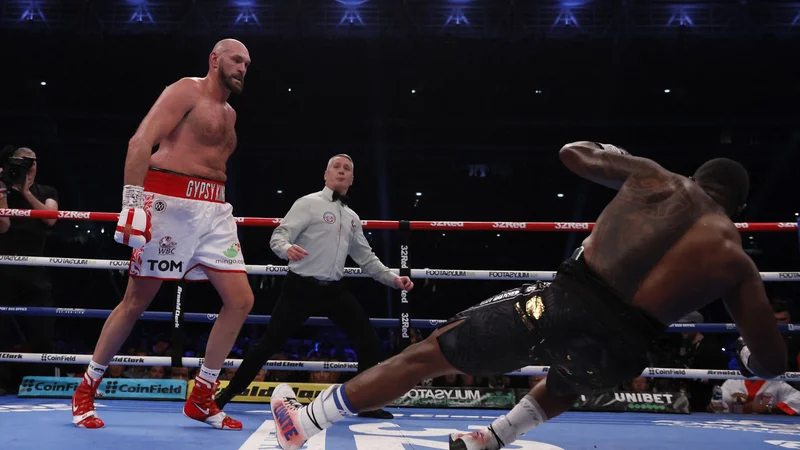 Fotografija: Tyson Fury je v šesti rundi prisilil k vdaji Dilliana Whyta. FOTO: Andrew Couldridge/Reuters
