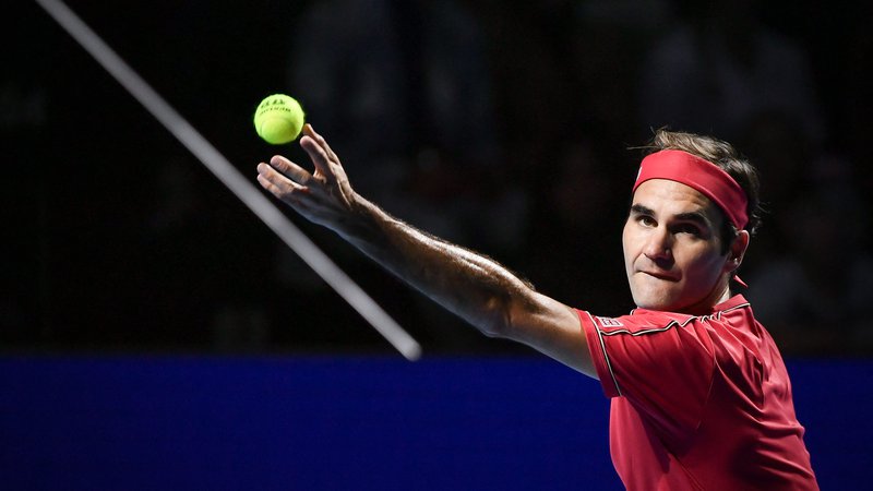 Fotografija: Roger Federer (na fotografiji) med finalnim dvobojem z Avstralcem Alexom De Minaurom v Baslu leta 2019. FOTO: Fabrice Coffrini/AFP
