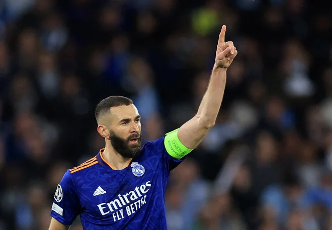 Karim Benzema je znižal izid v Manchestru. FOTO: Lee Smith/Reuters
