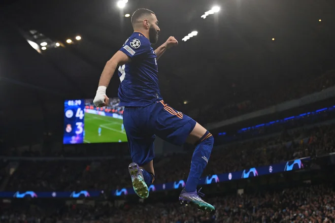 Karim Benzema pri 34 letih igra najboljšo sezono v Realovem dresu, odkar je leta 2009 prestopil iz Lyona. FOTO: Paul Ellis/AFP
