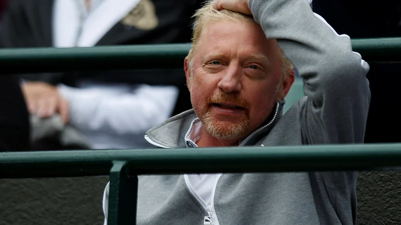 Fotografija: Boris Becker (na fotografiji) med turnirjem v Wimbledonu, ko je kot trener Novaka Đokovića leta 2016 spremljal njegov dvoboj z Američanom Samom Querreyjem. FOTO: Paul Childs/Reuters