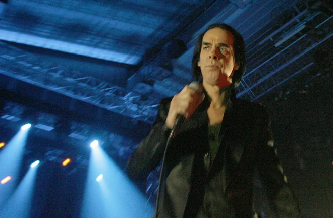 Nick Cave v Ljubljani leta 2013. S tremi ženskami je imel štiri otroke.&nbsp;FOTO: Mavric Pivk/Delo
