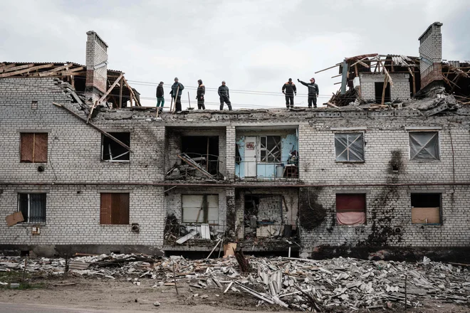 Ruske sile so na območjih na vzhodu Ukrajine, s katerih so se umaknile, za seboj pustile opustošenje. FOTO:&nbsp;Yasuyoshi Chiba/AFP
