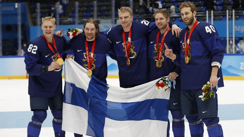 Fotografija: Finski hokejisti v Pekingu niso skrivali navdušenja po zgodovinski prvi osvojitvi naslova olimpijskih prvakov. FoTO: David W Cerny/Reuters
