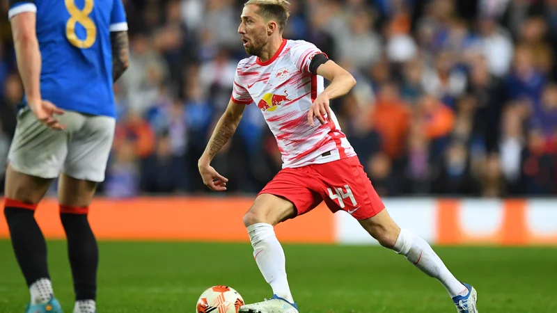 Fotografija: Kevin Kampl bo še naprej igral za Leipzig. FOTO: Andy Buchanan/AFP
