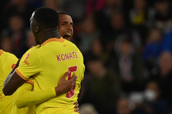 Joel Matip proslavlja po zadetku, ki je Liverpoolu na južni obali prinesel vse tri točke. FOTO: Glyn Kirk/AFP
