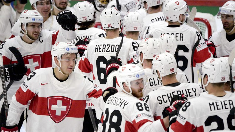 Fotografija: Švica se je veselila nove zmage. FOTO: Mikko Stig/AFP
