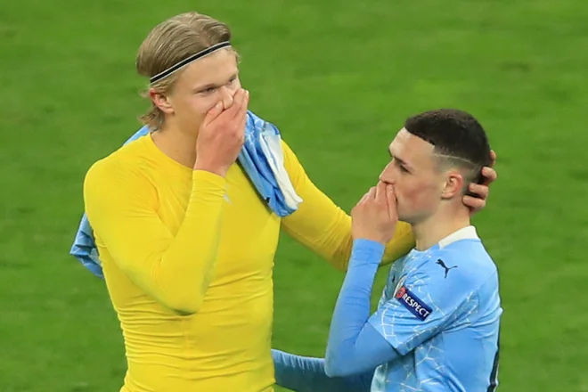 Erling Haaland in&nbsp;Phil Foden bosta odslej soigralca. FOTO: Wolfgang Rattay/AFP
