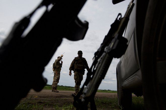 Ukrainska vojska v bližini frontne črte v regiji Doneck. FOTO: Anna Kudriavtseva/Stringer Reuters
