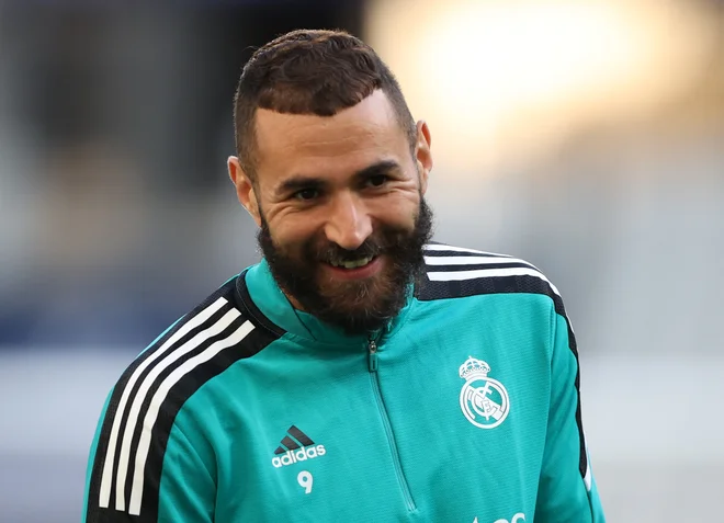 Bo Karim Benzema kakšno ušpičil tudi v finalu elitnega klubskega tekmovanja? FOTO: Molly Darlington/Reuters

