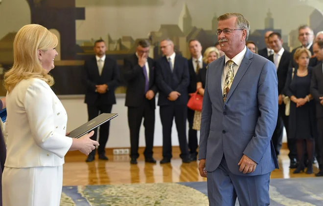 Mario Nobilo (na fotografiji med sprejemom pri nekdanji hrvaški predsednici Kolindi Grabar Kitarović) je pooblaščenec hrvaške vlade za podpis pristopnega protokola Švedske in Finske. FOTO: Ronald Goršić/Cropix