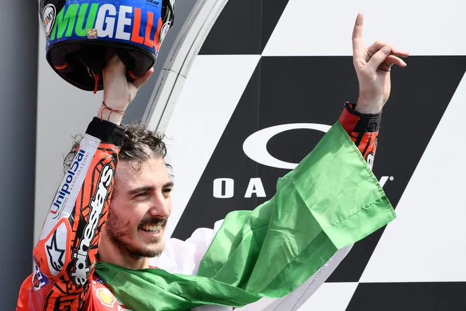 Francesco Bagnaia ni skrival navdušenja. FOTO: Filippo Monteforte/AFP
