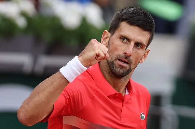 Novak Đoković branil lansko zmago in lovi tretjo lovoriko v Parizu. Foto Thomas Samson/AFP
